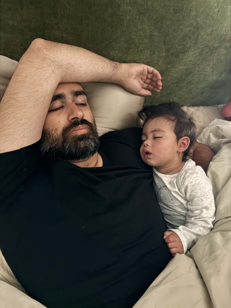 Mohammed and daughter napping